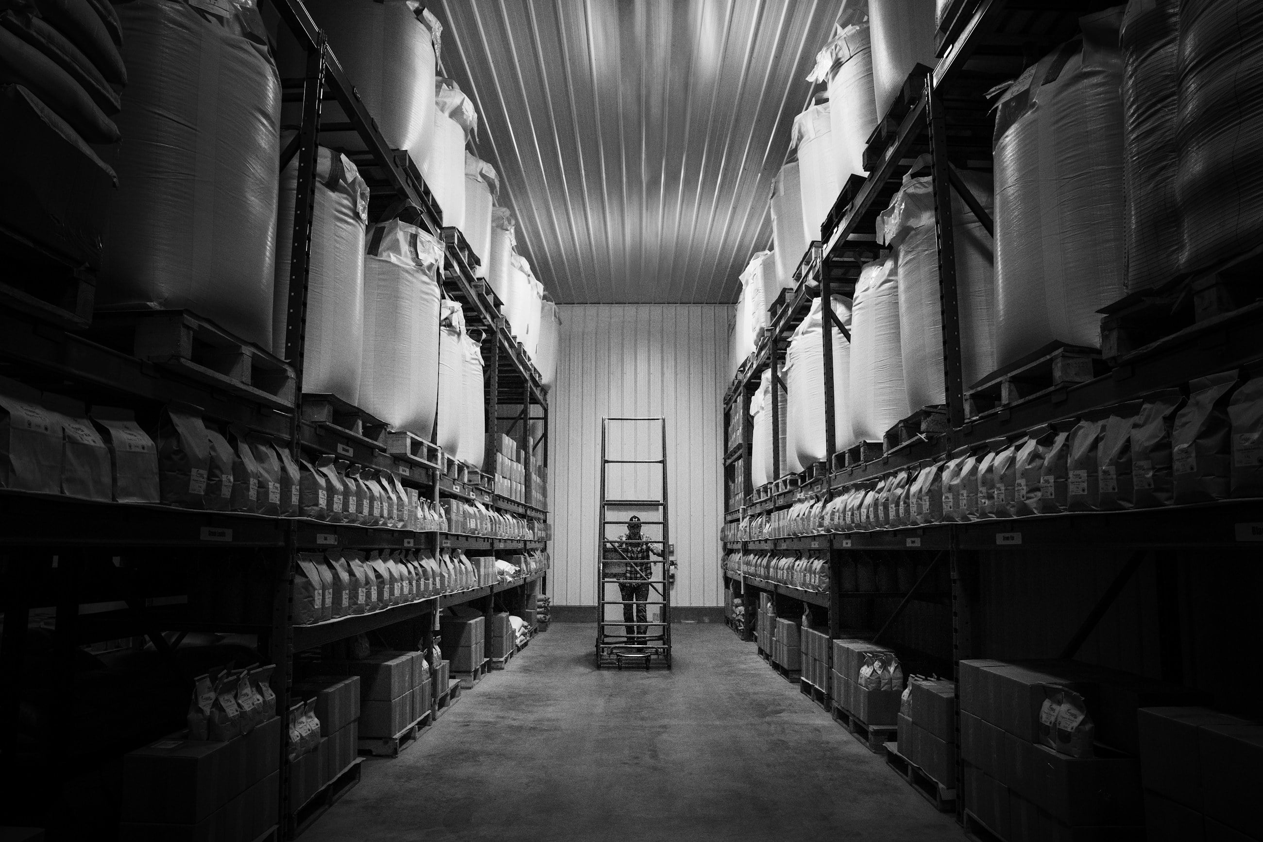 Warehouse aisle lined with pallet racking
